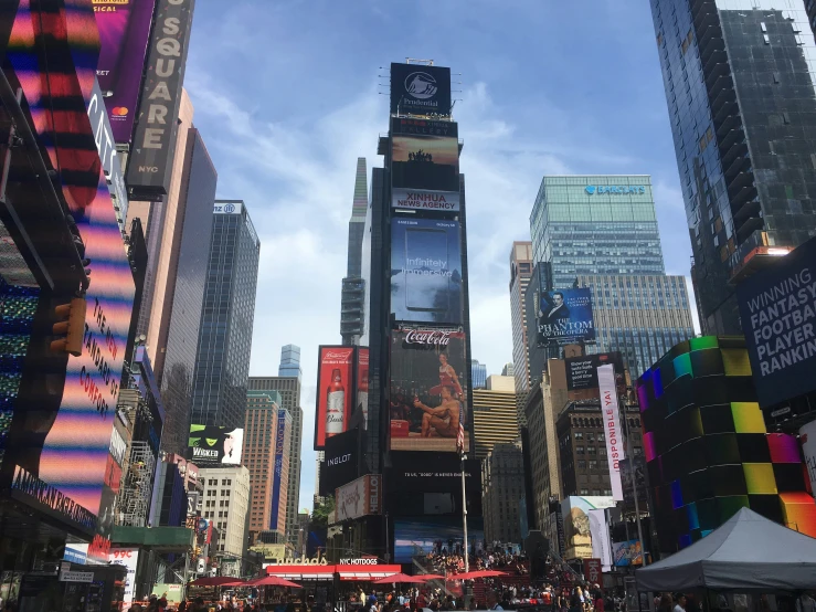 a city street that has a tall group of buildings