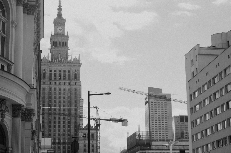 a tall city with two buildings next to each other