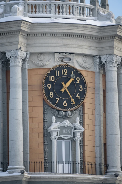 a large clock with roman numerals on it