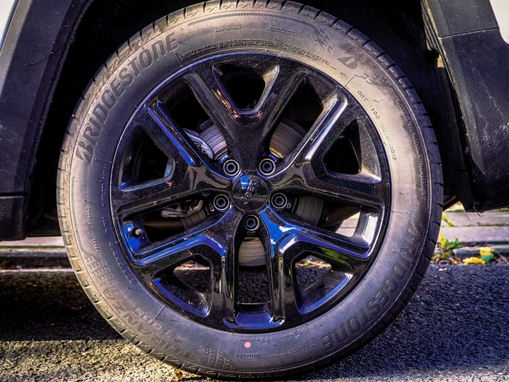 a close up of a tire on a vehicle