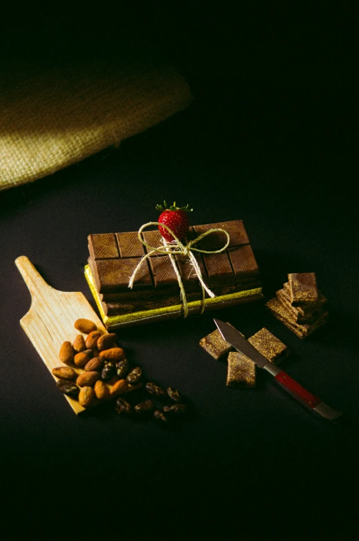 small box of food on a table with  tools