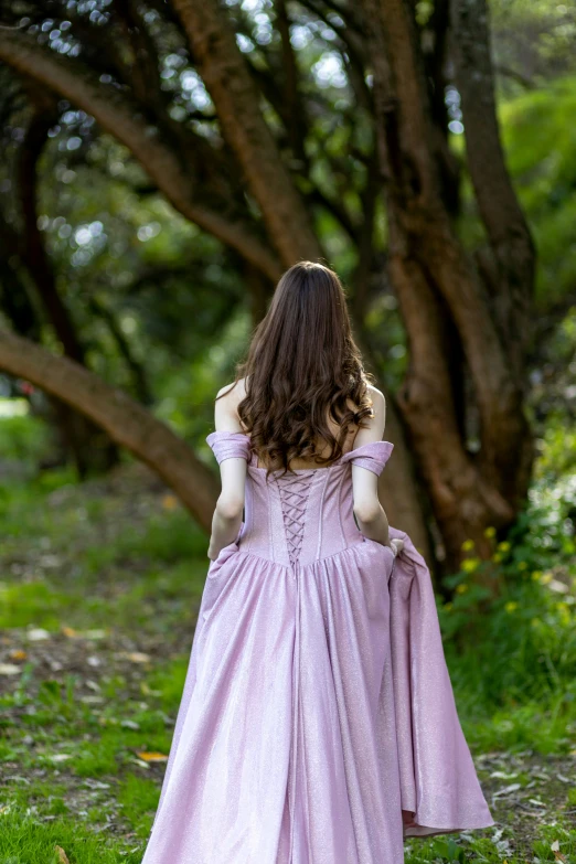 the back of the gown is shaped to look like a princess