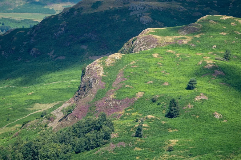 the view from a hill in a valley