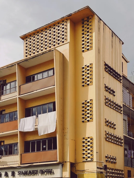 a large building with many windows in front of it