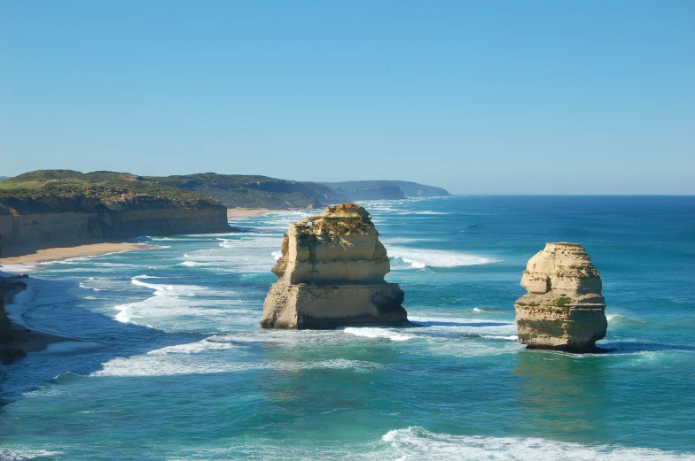 some tall rock outcropping in the ocean