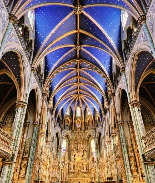 the interior of an old cathedral and cathedral pews