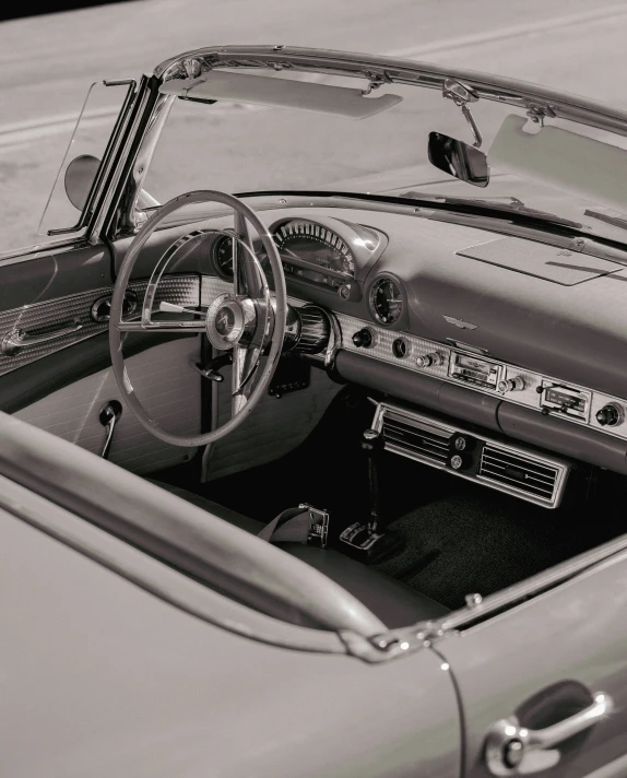 the interior of an older car with its dashboard