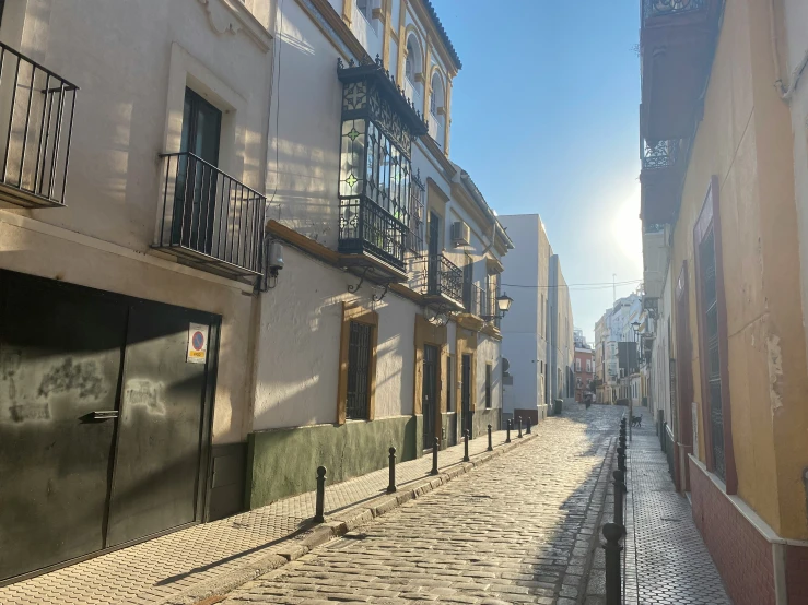 two rows of stone streets leading down to buildings