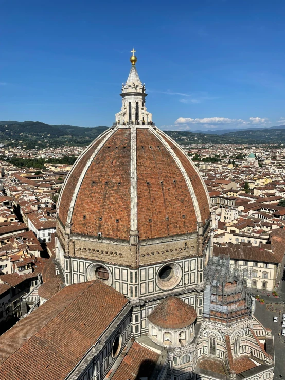 a large dome is shown above the city