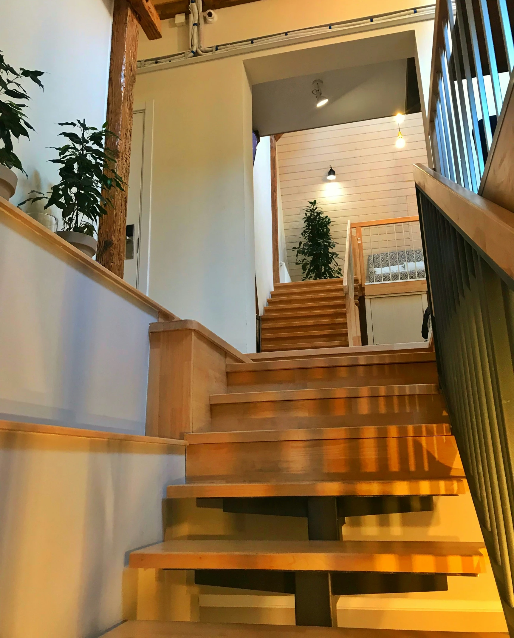 stairs lead up to an open space with wooden steps