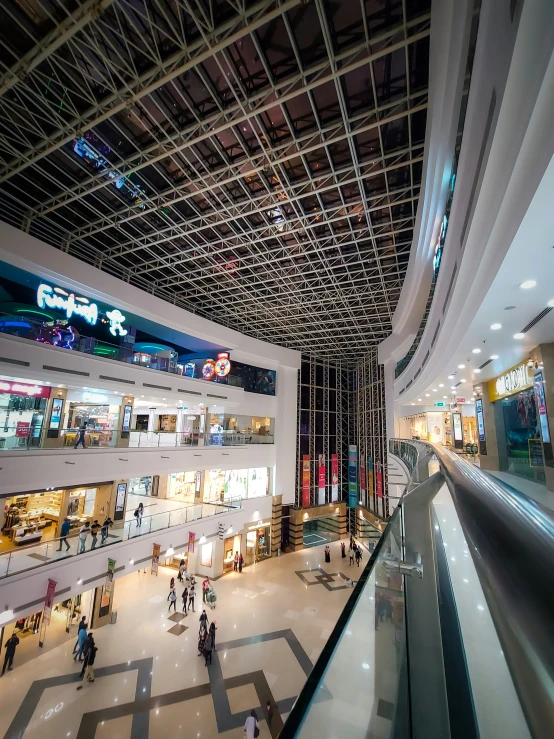 a mall building with many people and shops