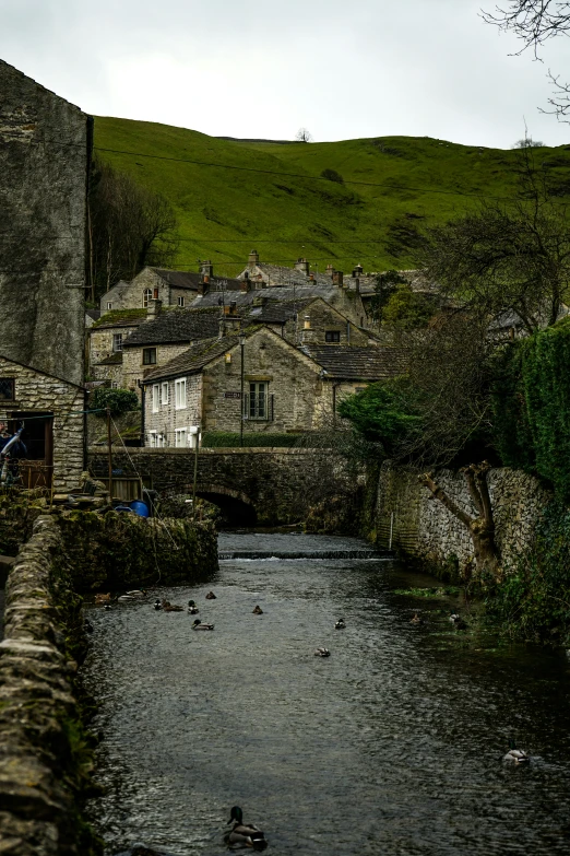 the view of a bridge that crosses a river