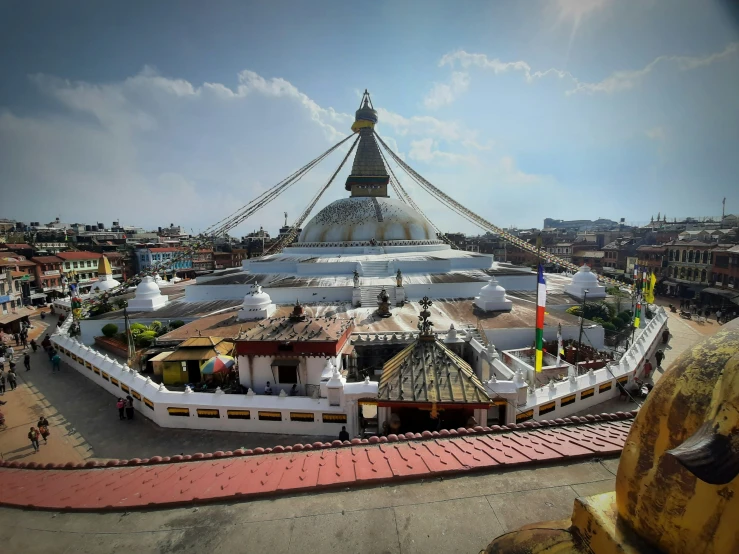 an aerial view of a round building in the center