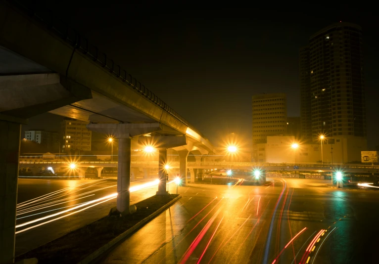 night time scene with lights and streaks on street