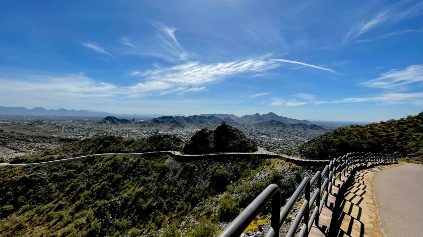 a view from the top of a hill on a nice sunny day