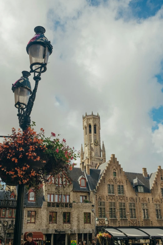 the large building has flowers growing on it's side