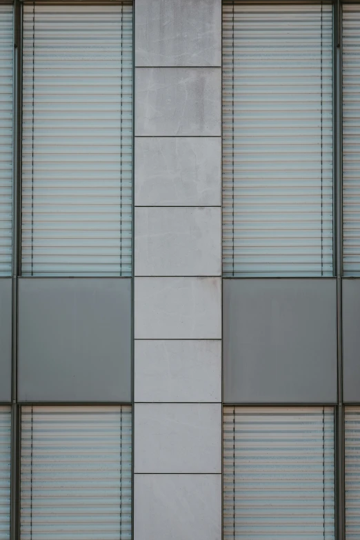 a couple of people sitting in front of windows