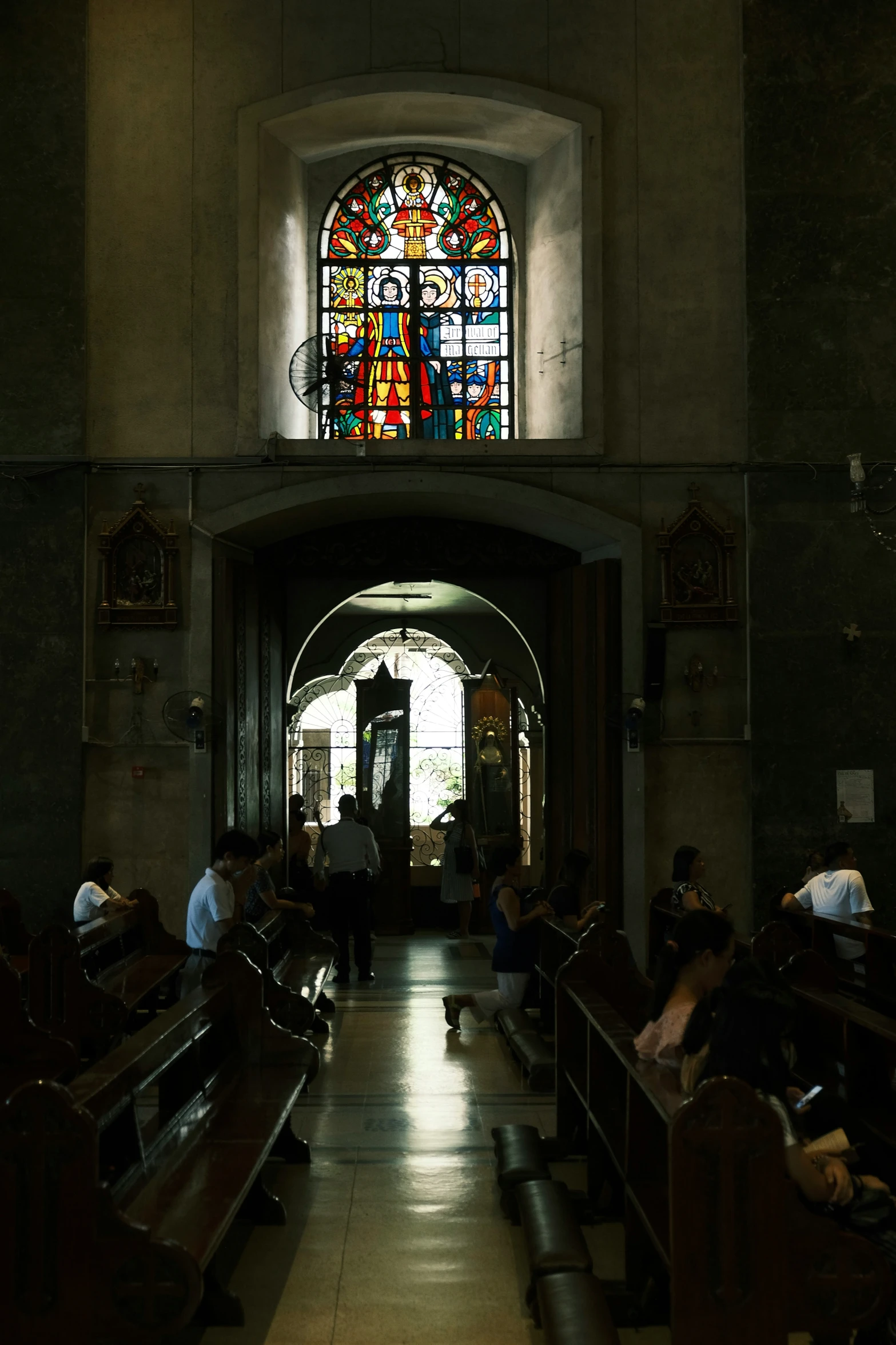 this church has many people seated in pews