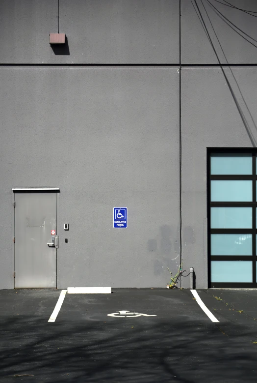 two white doors sit on a gray wall