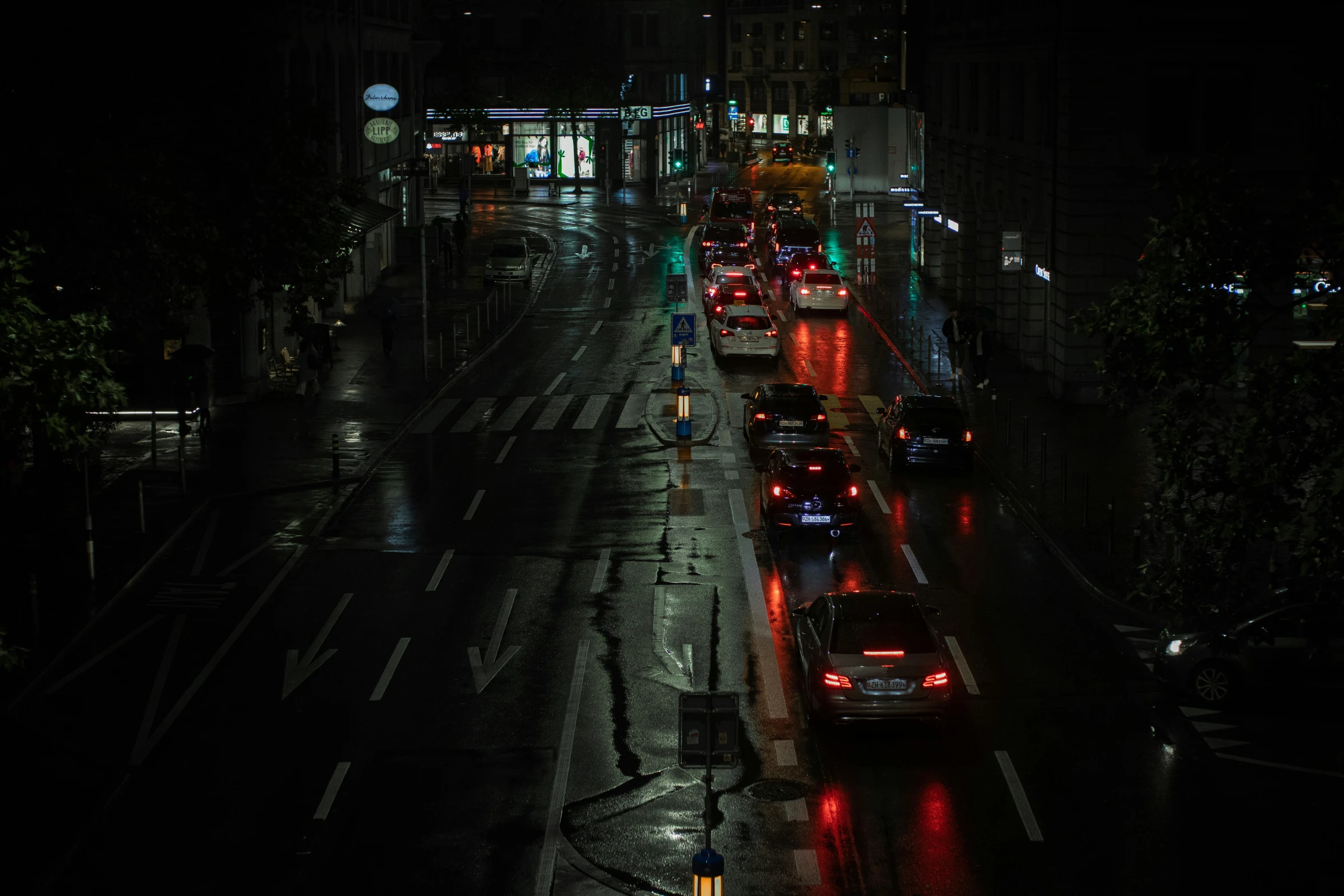 traffic is backed up on a street at night