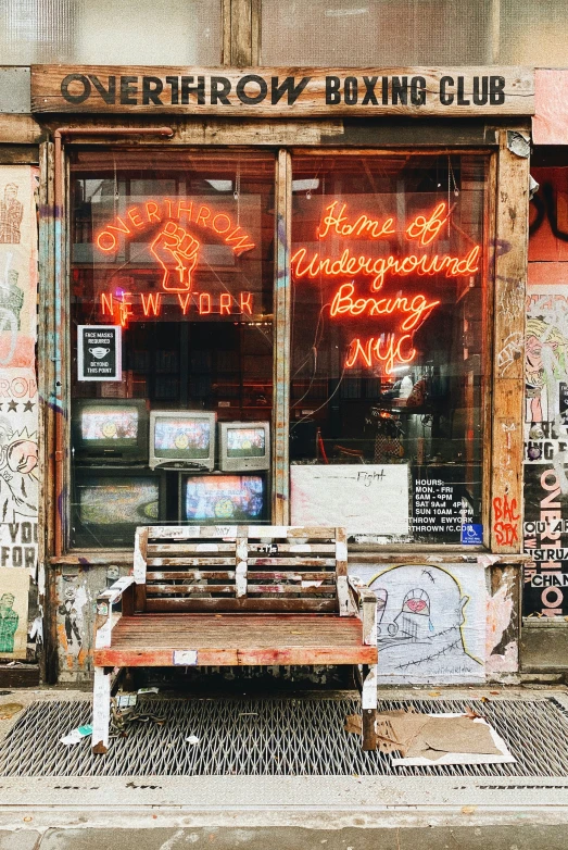 the sign for a business that has neon writing