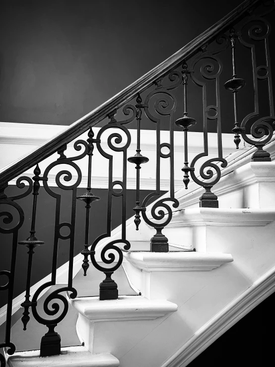 black and white pograph of staircases in a home