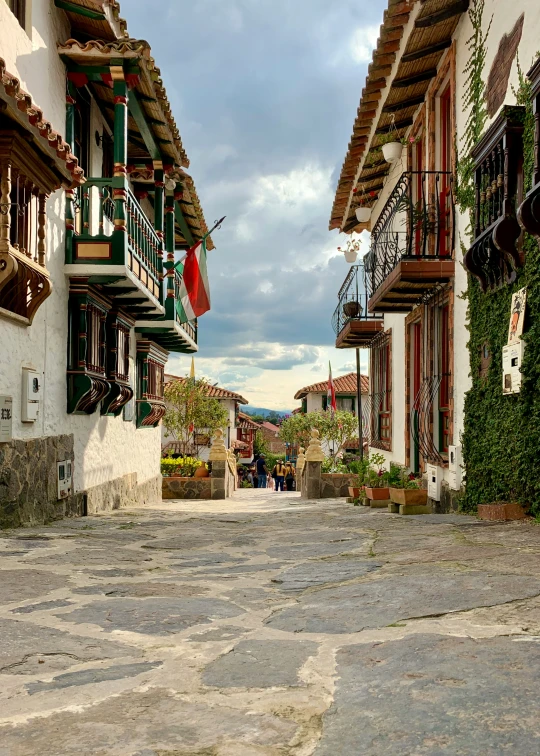 this is a cobblestone street in a small town