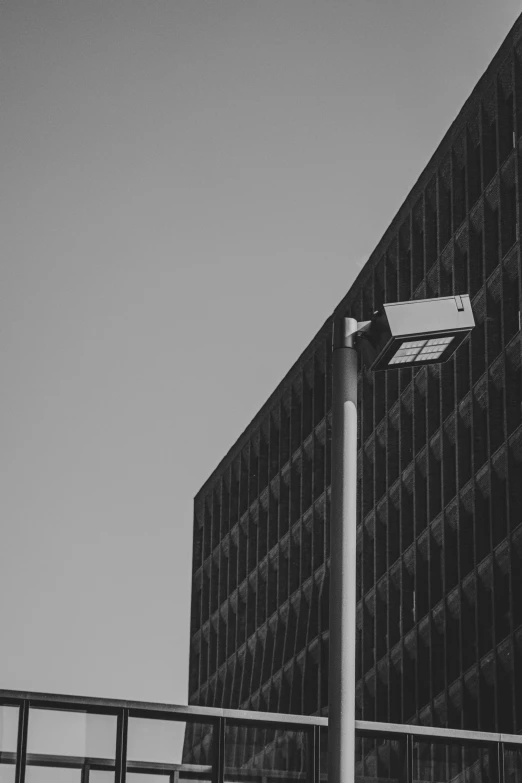 black and white pograph of a city street light