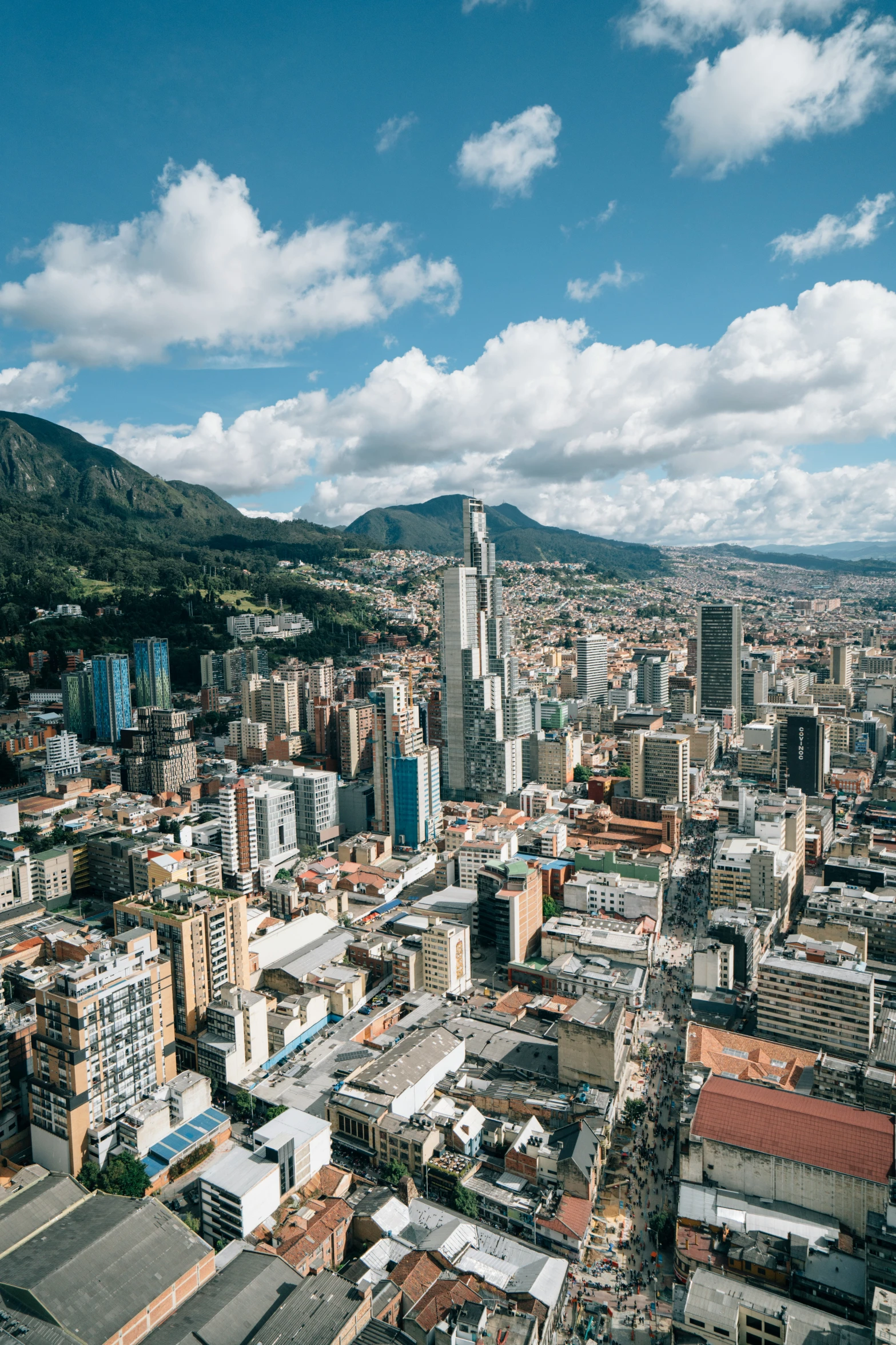 an aerial view of the city surrounded by tall buildings