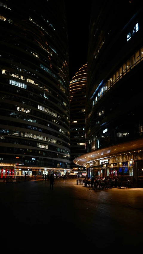 a city street with some very tall buildings