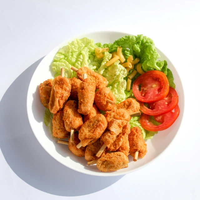 a plate filled with meat and vegetables