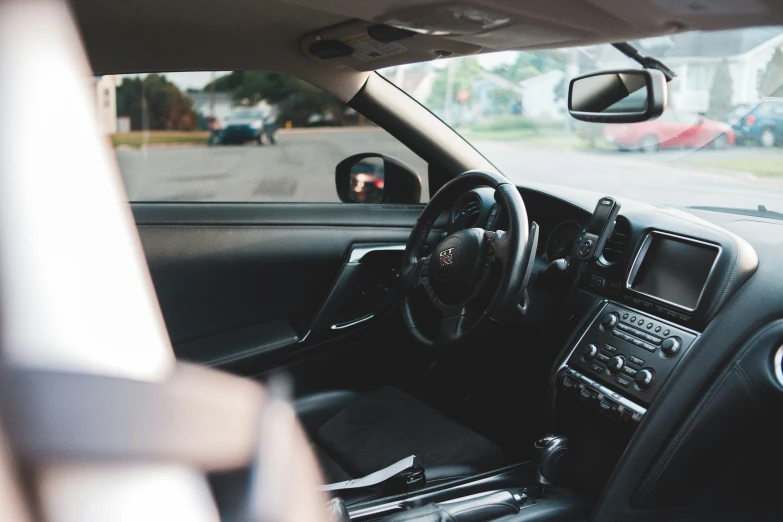 the interior of a car showing the driver's dashboard