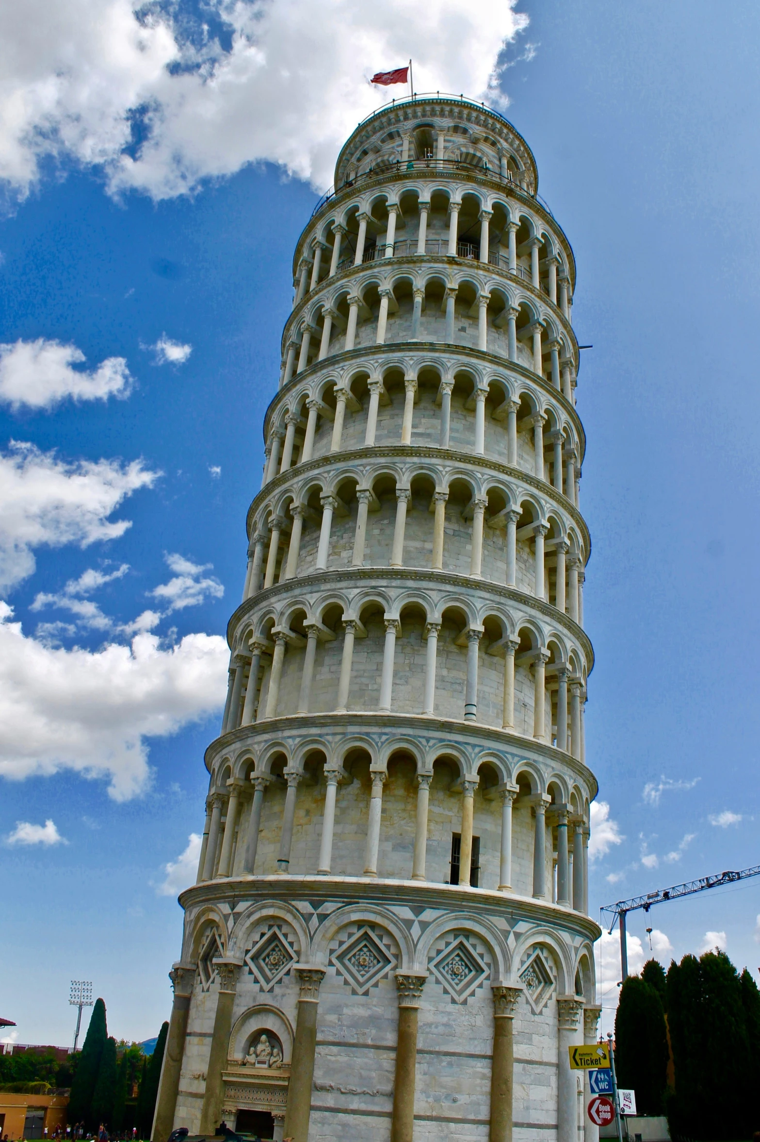 a very tall and big tower on the side of a street