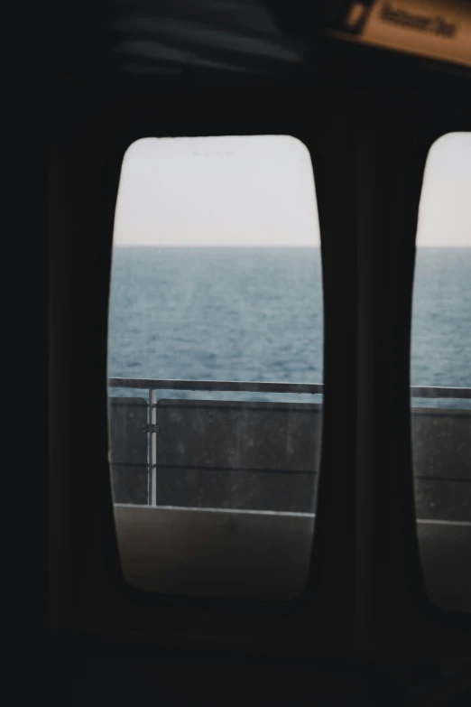 the view of the ocean from inside an airplane