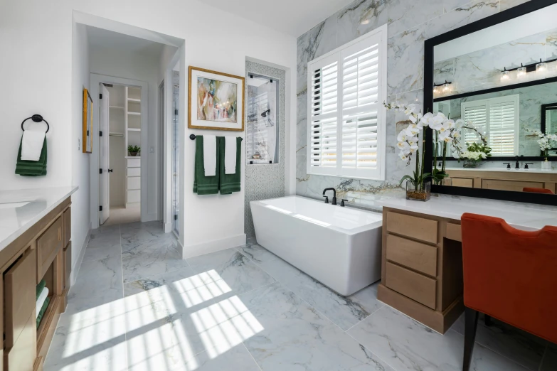 a very well decorated bathroom with white walls