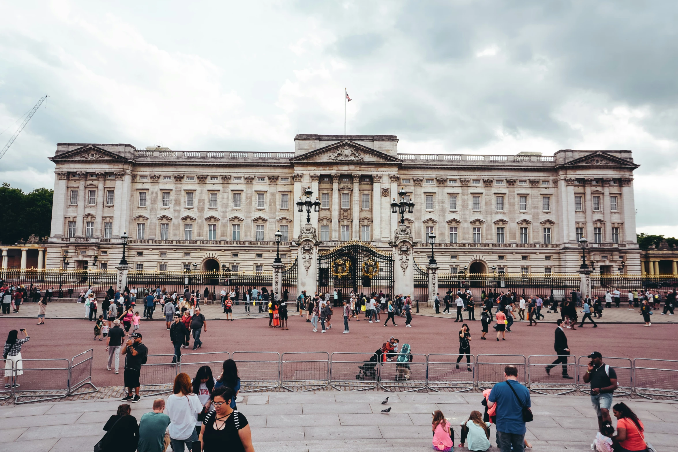 an old building with a crowd of people outside