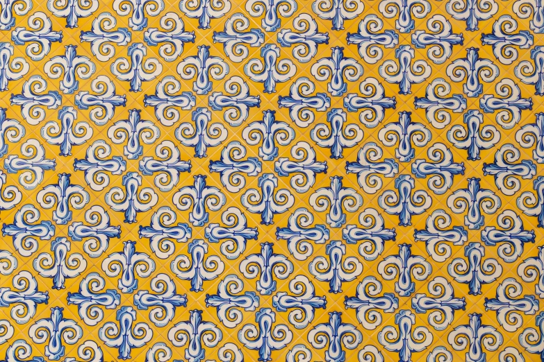 a close up view of an art work in yellow and blue