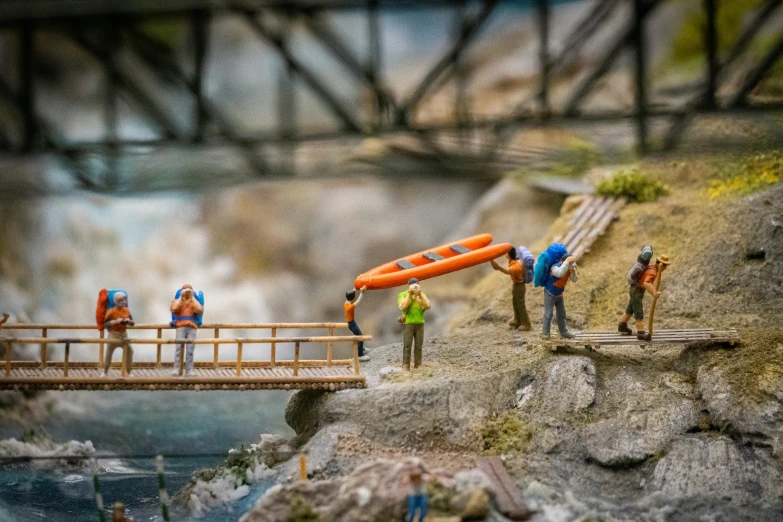 several people and rafters on the edge of a cliff