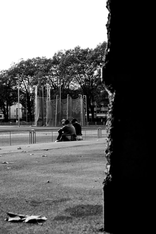 a group of people siting together and looking at soing