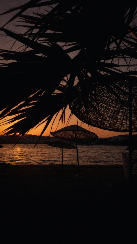 the sun is setting at this tropical beach