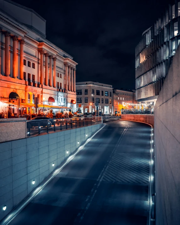 a night scene with a car on the street