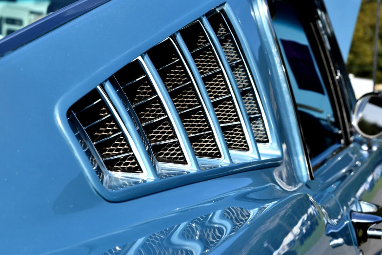 the hood or grille of a car as it is blue