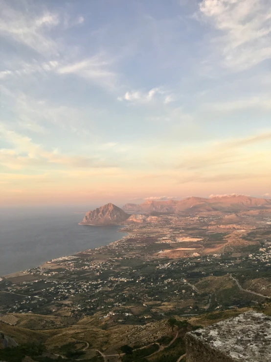 a scenic area with a body of water and a mountain