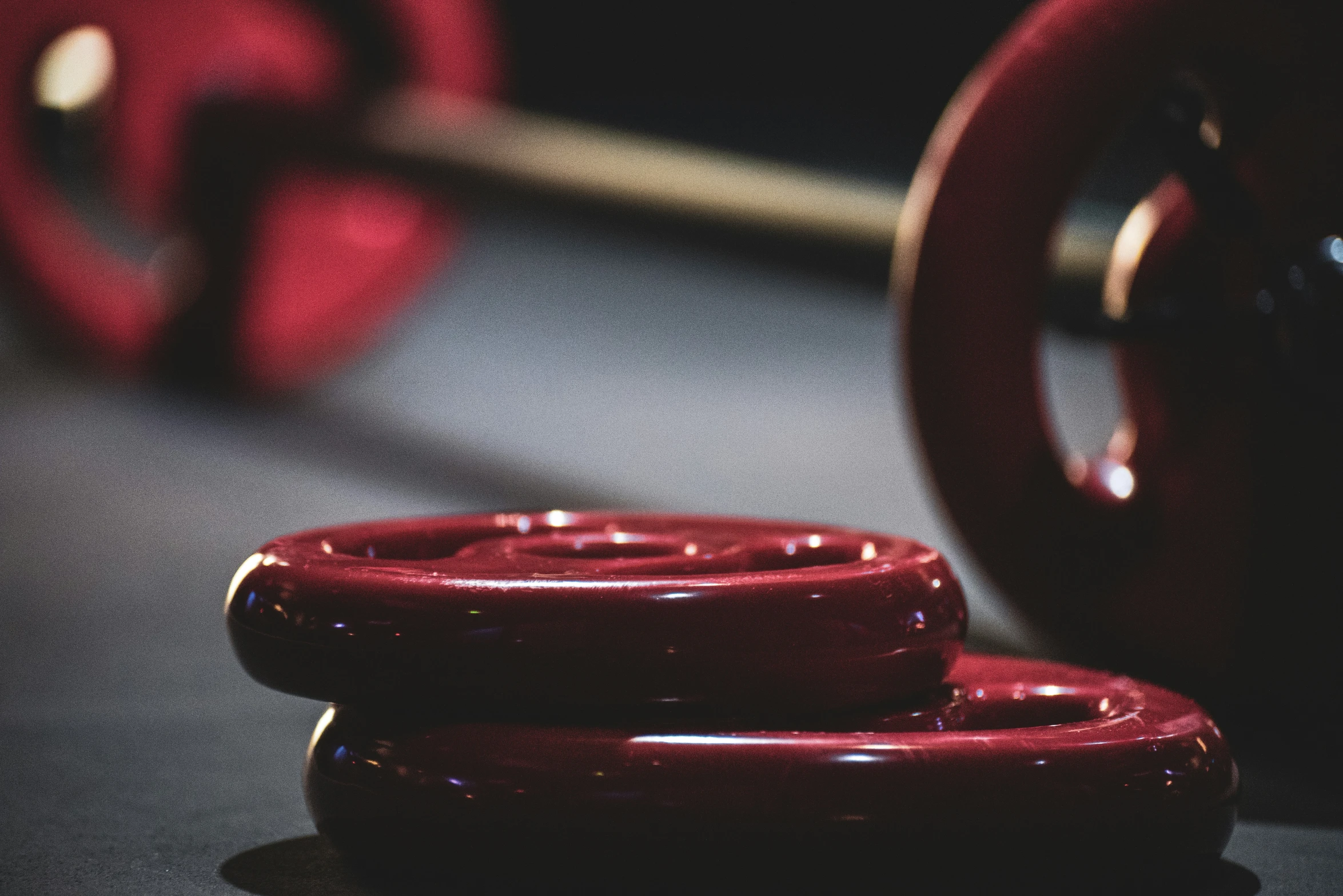 closeup of red ceramic cups on a table