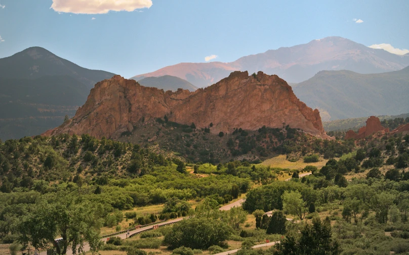 a scenic s of rocky mountains and trees