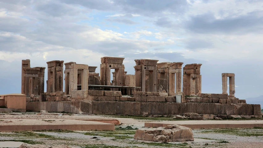 an ancient temple sits among the ruins of the desert