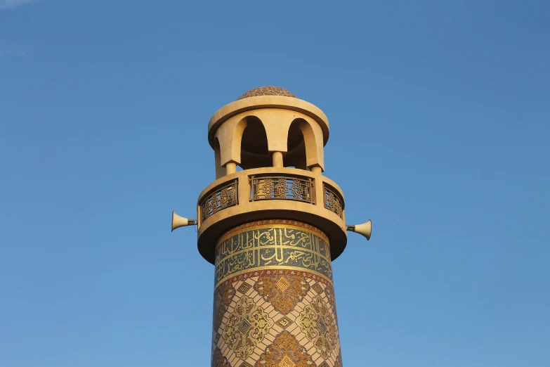 this is an image of the top of a tall building with a clock tower