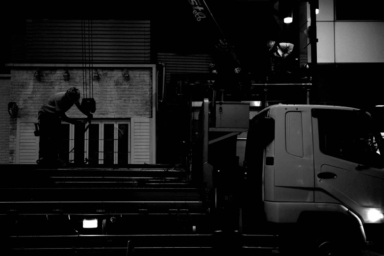 a large truck sitting in front of a building