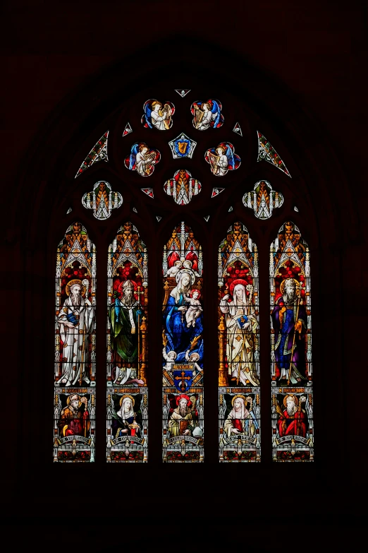 an image of a stained glass window that looks like jesus