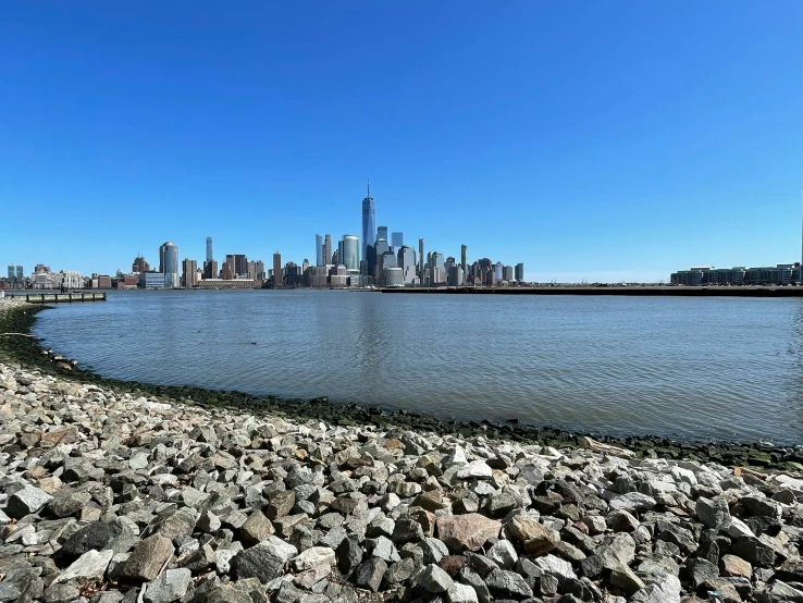 a view of the manhattan skyline from across the river